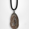 Holy land jewelry Sea of Galilee pebble stone pendant designed with a fish and jesus caption