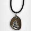 holyland souvenir pebble stone pendant designed with an ancient fishing boat