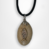 holyland souvenir pebble stone pendant designed with a fish and jesus caption